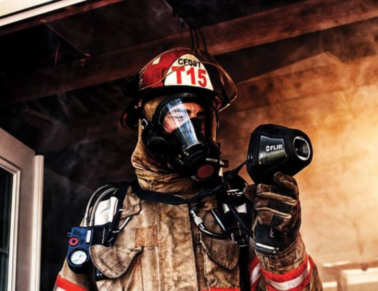 firefighter with flir thermal imager